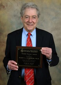 Eliot Gardner, Ph.D. with the Pioneer Award