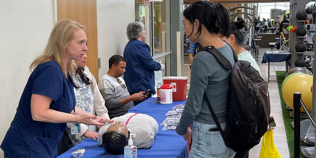 NIDA IRP Nurse Stacy Shimer providing Naloxone education and training at the 3rd Annual NIDA IRP Health Fair. LA Fitness Center, Baltimore, MD.jpg