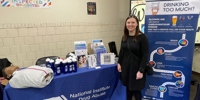 NIDA IRP Volunteer Anna Loften at YO! Baltimore Community Resource Day, West Baltimore, MD