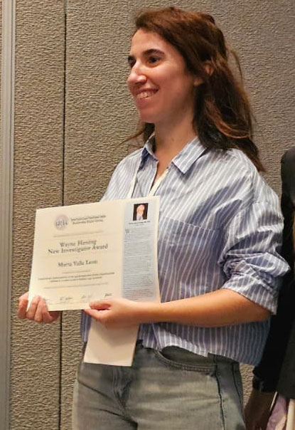 Marta Valle Leon, Ph.D. receiving her award.